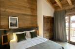 Experience rustic charm in this cozy bedroom.