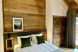 Experience rustic charm in this cozy bedroom.