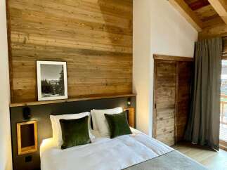 Experience rustic charm in this cozy bedroom.