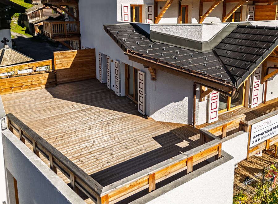 Experience luxurious living with this stunning property featuring a spacious wooden deck perfect for outdoor entertaining.