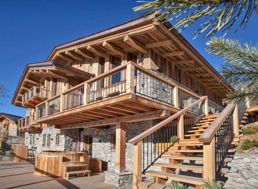 Experience luxury living in this stunning wooden chalet.