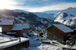 Experience the charm of a snow-covered village nestled in the heart of the mountains.