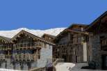 Discover the charm of these stunning stone-clad chalets, nestled in a picturesque mountain setting.