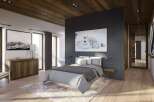 Experience luxury in this stunning bedroom featuring a cozy ambiance.