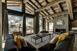 Experience luxury living in this stunning chalet with breathtaking mountain views.