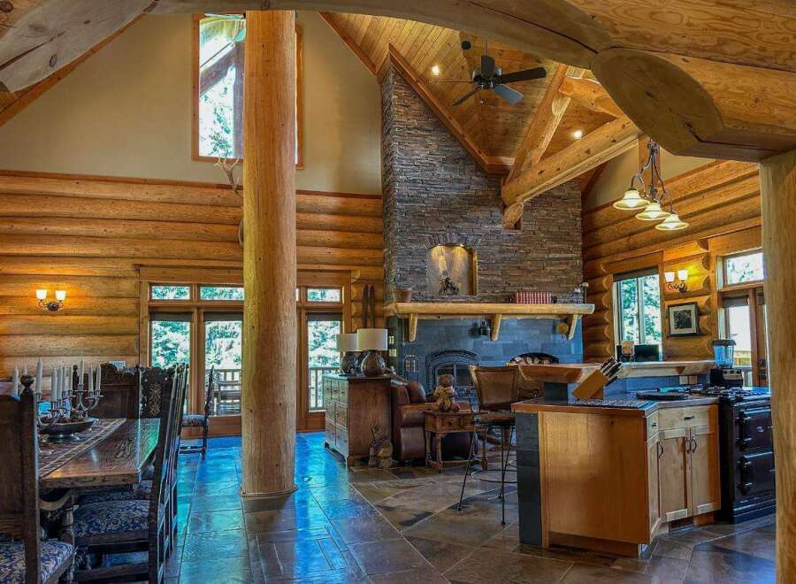 Experience rustic luxury in this stunning log cabin home.