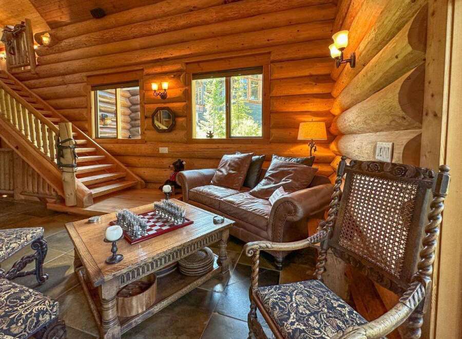 Step into rustic elegance with this stunning log cabin interior.
