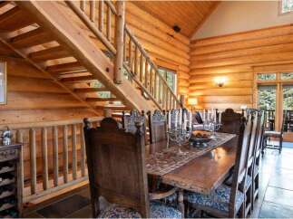 Step into rustic elegance with this stunning log cabin home.