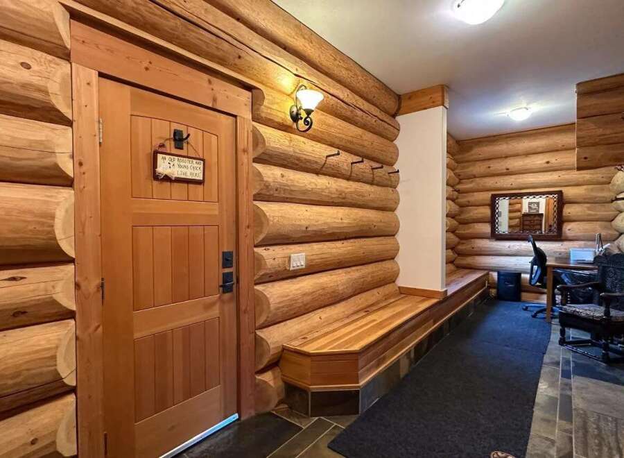 Step into rustic charm with this stunning log cabin interior.