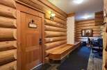Step into rustic charm with this stunning log cabin interior.
