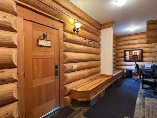 Step into rustic charm with this stunning log cabin interior.
