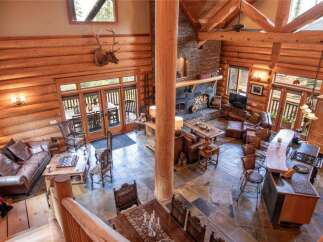 Experience luxury living in this stunning log cabin home.