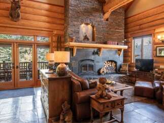 Step into rustic elegance with this stunning log cabin.
