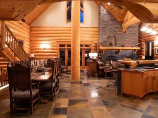 Step into luxury with this stunning log cabin home.