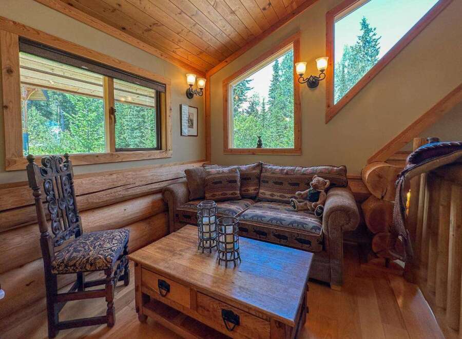 Step into rustic charm with this cozy cabin retreat.