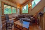 Step into rustic charm with this cozy cabin retreat.