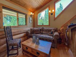 Step into rustic charm with this cozy cabin retreat.