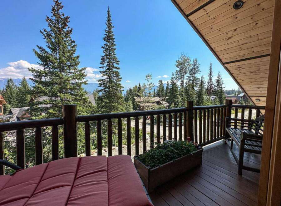 Enjoy breathtaking mountain views from this stunning balcony.
