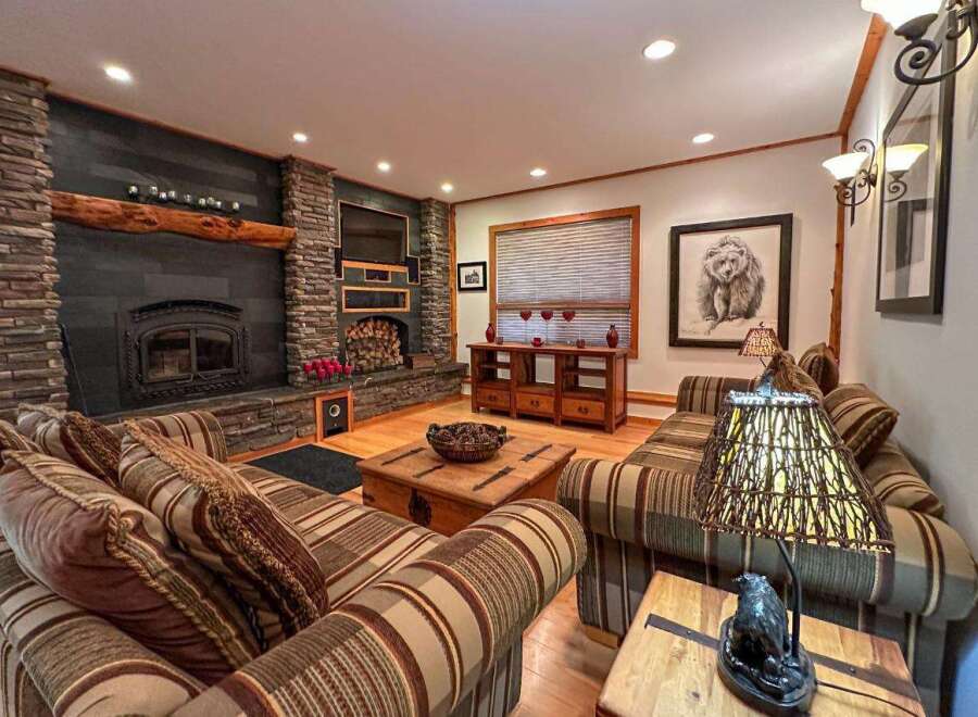 Step into rustic elegance with this stunning living room.