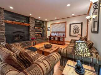 Step into rustic elegance with this stunning living room.