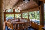 Experience the rustic charm of this stunning property, featuring a beautifully crafted wooden interior.