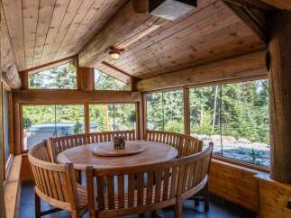 Experience the rustic charm of this stunning property, featuring a beautifully crafted wooden interior.