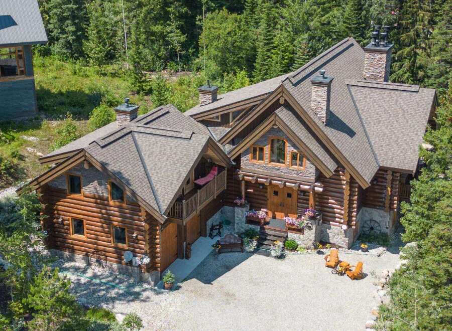 Discover the charm of this stunning log cabin home nestled in a serene, wooded setting.