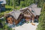 Discover the charm of this stunning log cabin home nestled in a serene, wooded setting.