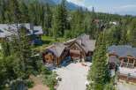 Nestled amidst a lush forest, this stunning log cabin offers a serene escape.