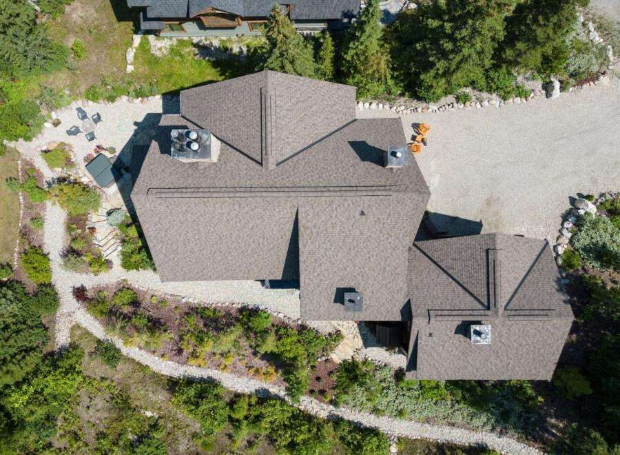 Discover a stunning property with a beautifully designed roof, offering both aesthetic appeal and structural integrity.