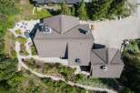 Discover a stunning property with a beautifully designed roof, offering both aesthetic appeal and structural integrity.
