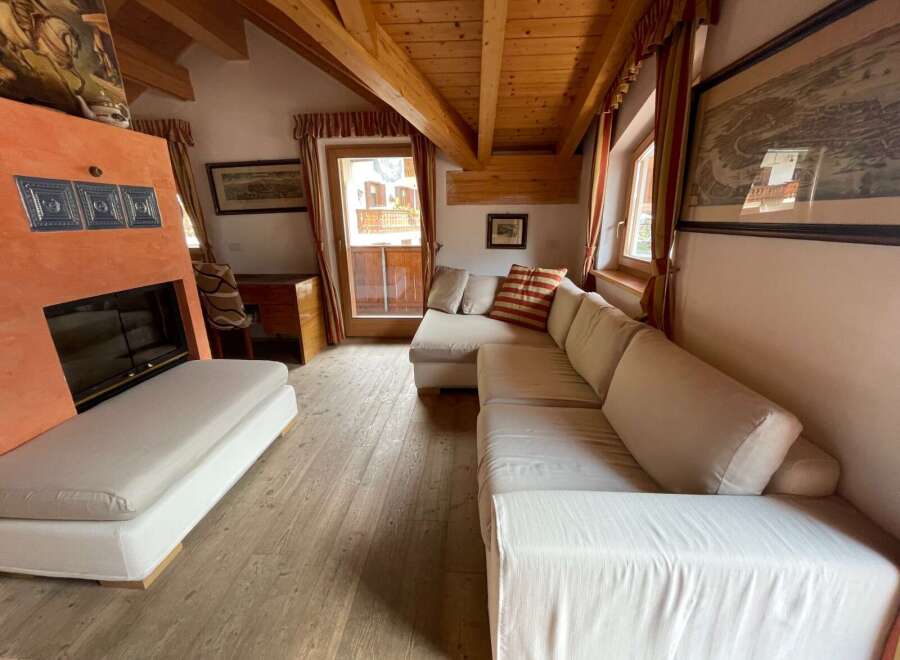 Cozy living room with a fireplace and comfortable seating.
