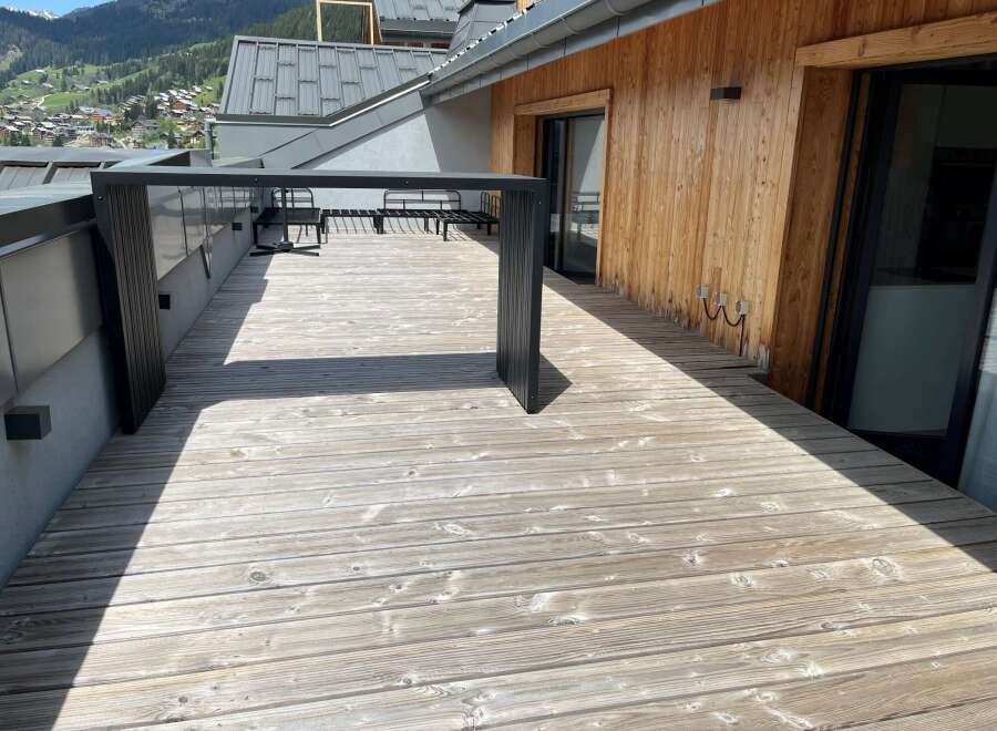 Enjoy breathtaking mountain views from this stunning deck.