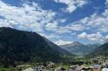 Breathtaking mountain views await from this charming property.