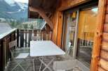 Enjoy breathtaking mountain views from this charming balcony.