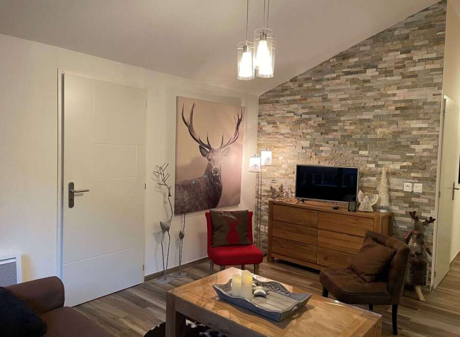 Cozy living room with a rustic touch.