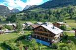 Discover a stunning mountain chalet nestled in a picturesque alpine village.