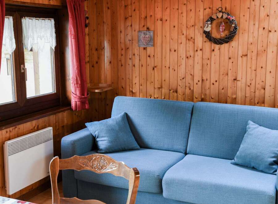 Cozy living space with a charming wooden interior.