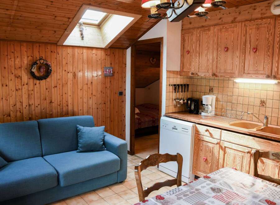 Cozy cabin retreat with charming wooden interiors.