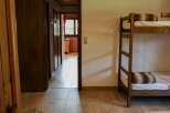 Cozy bedroom with a bunk bed, perfect for a family getaway.