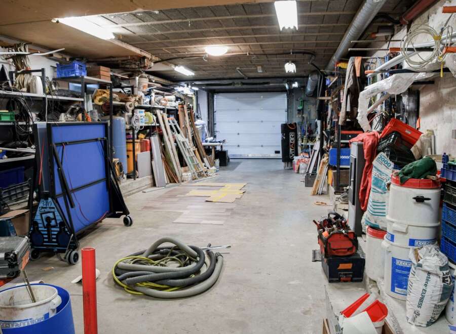 This spacious storage area offers ample room for various items.