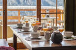 Enjoy a delightful breakfast with a stunning mountain view.