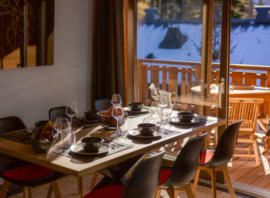 Enjoy a cozy dining experience in this beautifully designed space.
