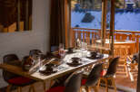 Enjoy a cozy dining experience in this beautifully designed space.