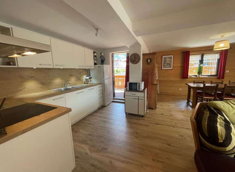 Cozy kitchen with modern appliances and ample counter space.