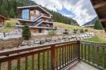 Experience luxury living in this stunning mountain lodge.
