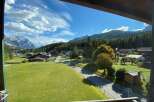 Enjoy breathtaking mountain views from this charming property.