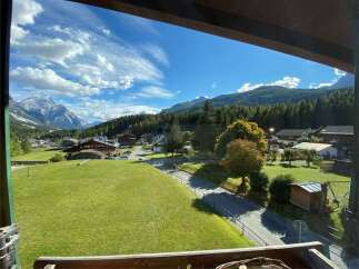 Enjoy breathtaking mountain views from this charming property.