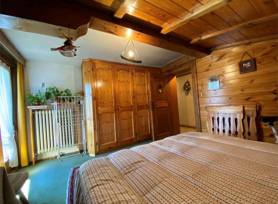 Cozy bedroom with wooden accents.
