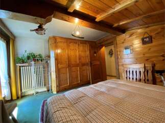 Cozy bedroom with wooden accents.